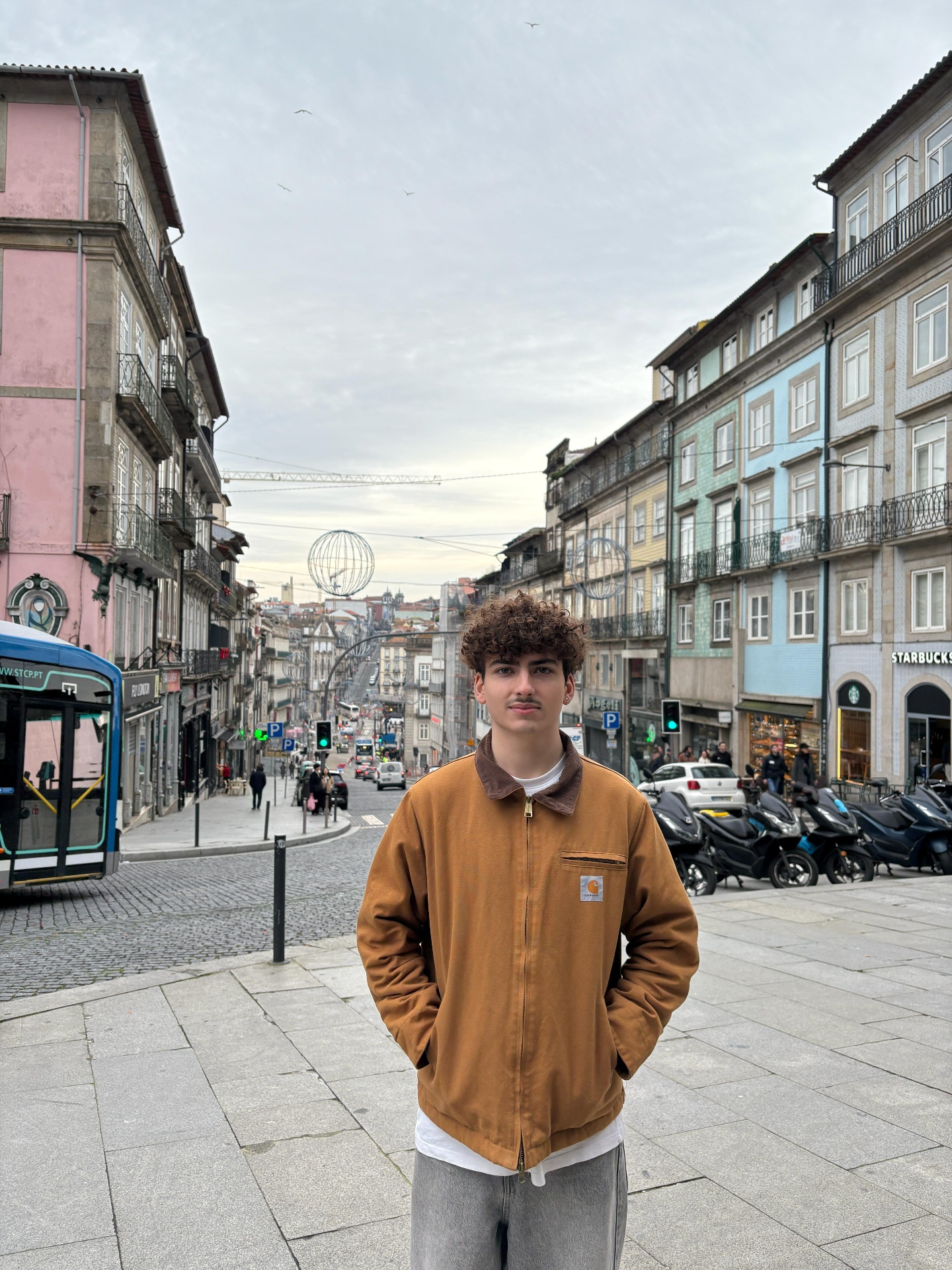 Rúben, founder of Enso Systems, standing on Rua de Sá da Bandeira in downtown Porto, Portugal